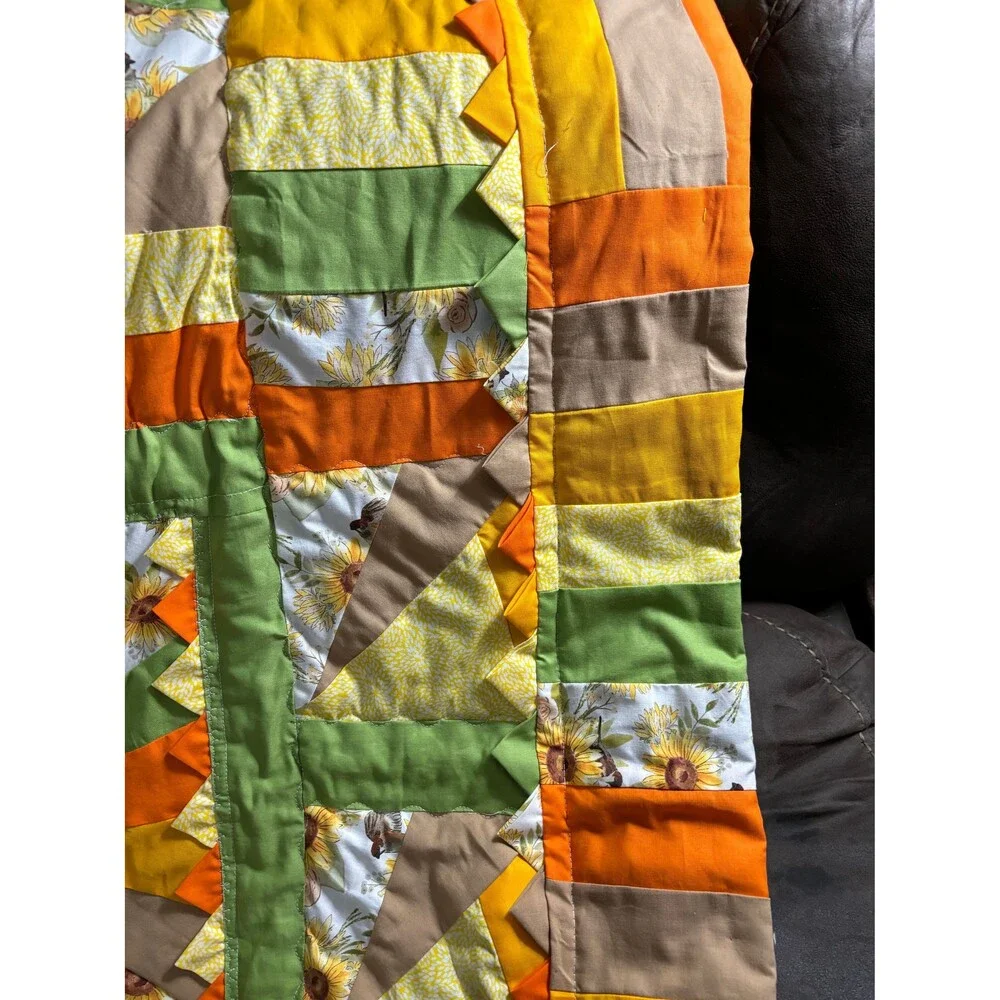 Cheerful,happy, colorful sunflower theme lap quilt or baby quilt. 41” x 40”